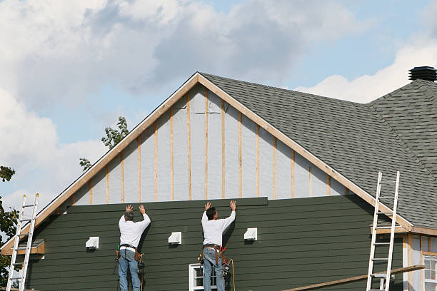 Professional Siding technician working in North Wales, PA